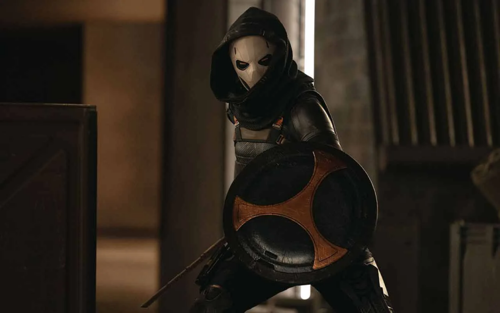 Personagem de Olga Kurylenko, Treinadora